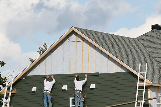 Professional Siding Replacement technician working in Somerville, MA